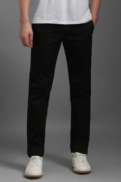 Buy Men Black Slim Tapered Fit Solid Flat Front Casual Trousers Online ...