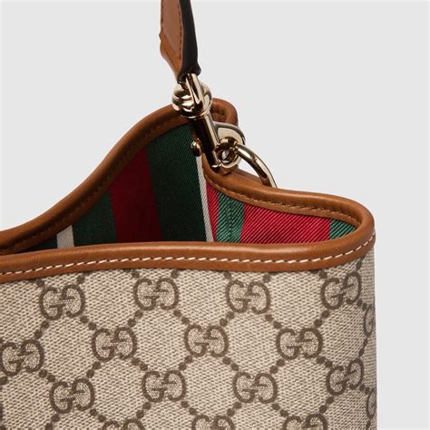 Borsa a secchiello GG Emblem misura media in tessuto beige e marrone ...