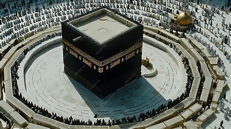 This image shows the Kaaba a cubeshaped building in Mecca Saudi Arabia that is the most sacred ...