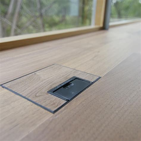 Beautifully Concealed Electrical Outlets in Hardwood Floors