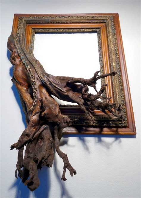 Sculptural picture frames perfectly fusing with tree roots and branches ...