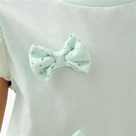 Buy Juniors Bow Applique Top from Juniors at just INR 1299.0 at Babyshop