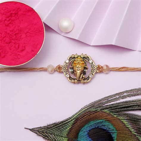 Meenakari Ganesha Rakhi – The Purple Tree