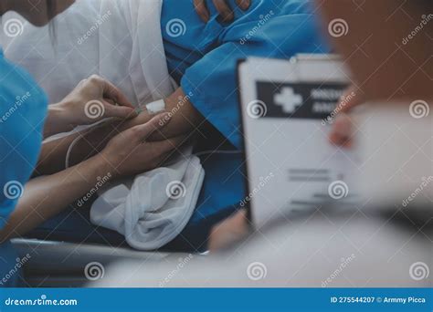 Injured Patient Showing Doctor Broken Wrist and Arm with Bandage in ...