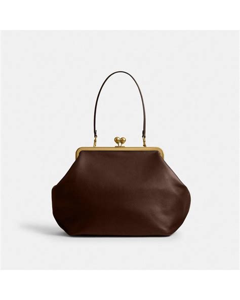 COACH Large Kisslock Frame Bag in Brown | Lyst