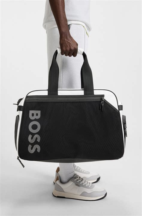 BOSS - Colour-blocked holdall with reflective logo - White