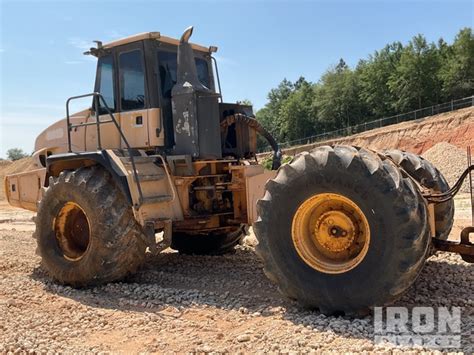 Image result for Bell Scraper Tractor