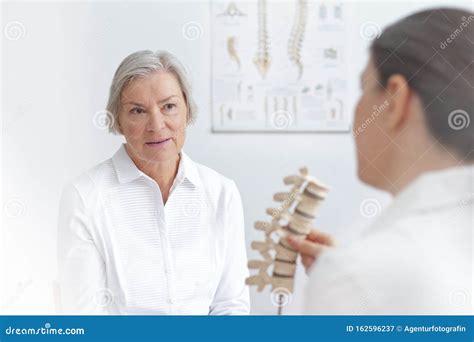 Doctor Senior Patient Slipped Disk Stock Image - Image of disc, column: 162596237