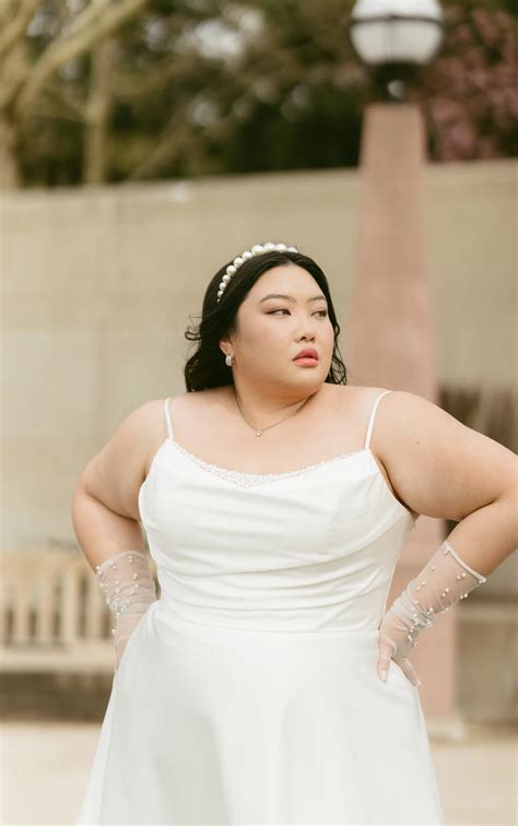 Princess Plus Size Wedding Dress with Pearl Embellishments
