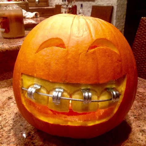 Pumpkin with braces! | Halloween decorations, Pumpkin carving, Creative ...