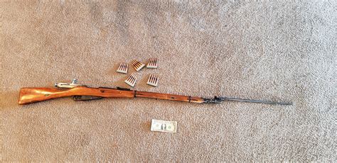 My new, original 1937 mosin nagant with bayonet. It has the sickle and ...