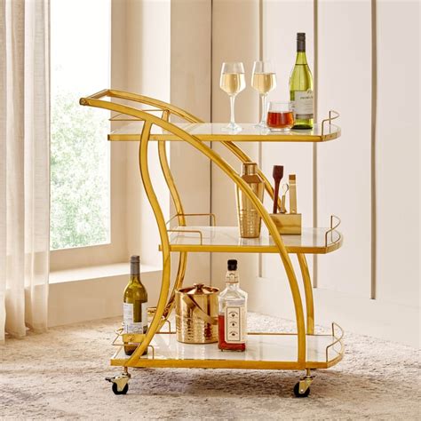 Buy Lance Serving Trolley - Gold from Home Centre at just INR 24999.0