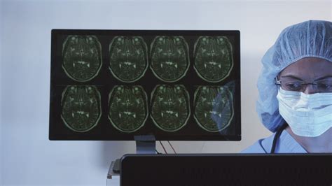 Image of a doctor and a patient reviewing a scan.