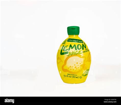 A plastic squeeze bottle with a flip-top lid of Concord Foods Lemon ...