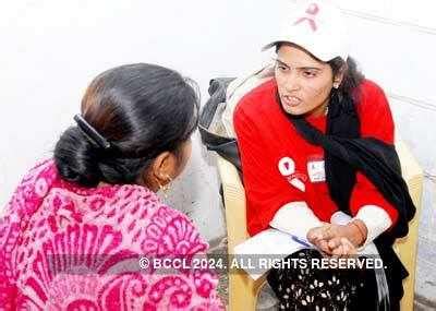 Activists from NGO, students and social activists carry placards during ...