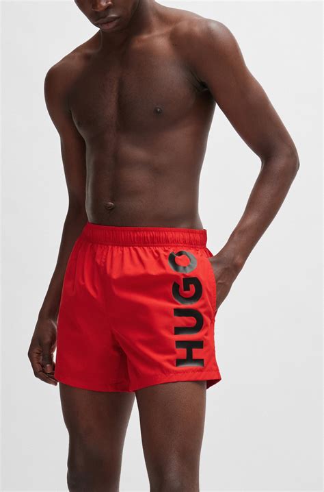 HUGO - Quick-dry swim shorts with vertical logo print - Red