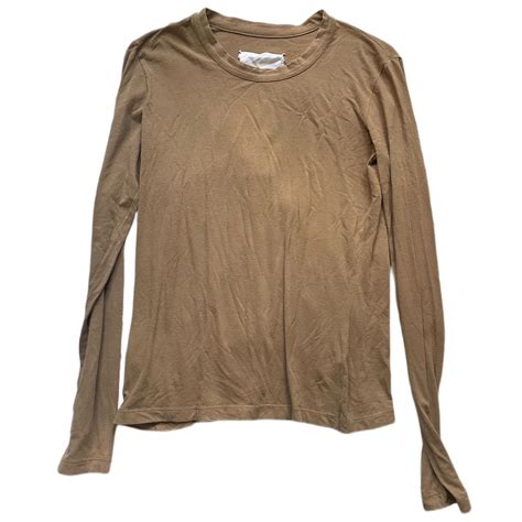 vintage margiela tan long sleeve shirt. has a good... - Depop