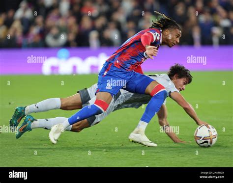 London ENGLAND - October 18: Crystal Palace's Michael Olise and Wolverhampton Wanderers' Hugo ...