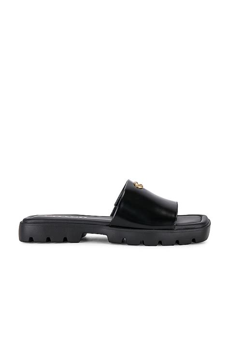 Coach Florence Sandal in Black | REVOLVE