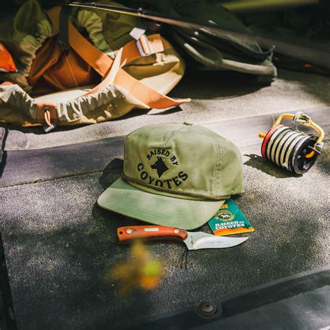 Raised by Coyotes Western Outdoor Recreational Apparel