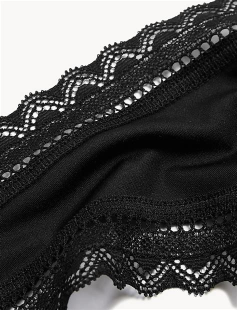 Buy 5pk Microfibre & Lace Trim Thongs at Marks & Spencer