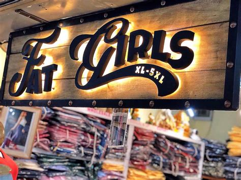 Plus-size clothing stores called 'Fat Girls' and 'Moo Moo' in Thailand