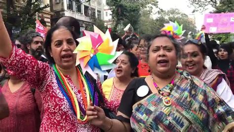 A group of parents from the LGBTQIA community chant supportive lines at ...