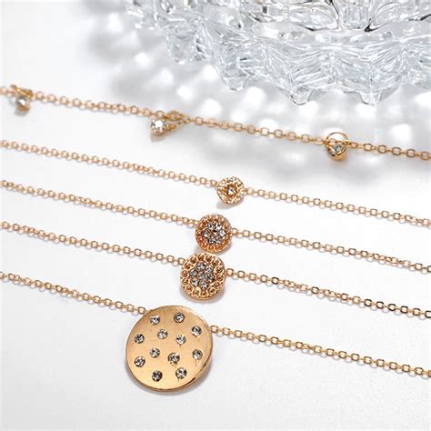 Scintillare by Sukkhi Dazzling Gold Plated Multi Layered Necklace for ...