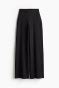 Flared sports trousers with SoftMove™ - Black - Ladies | H&M IN