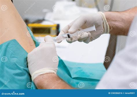 Orthopedic Doctor Injecting Cortisone in Slipped Disc Stock Photo - Image of injection ...