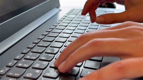 close up view typing laptop keyboard 23176011 Stock Video at Vecteezy