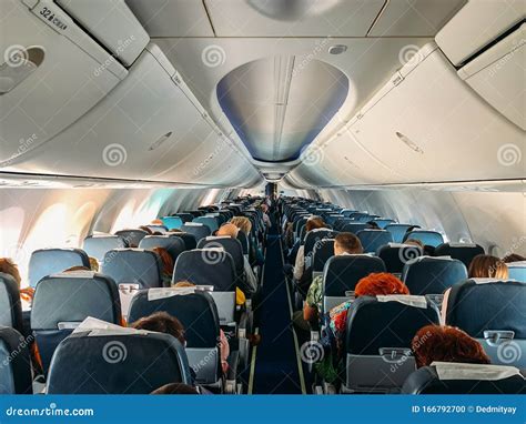 Airplane Interior Inside with Passengers in Flight Stock Photo - Image ...