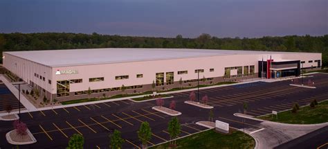 Magna opens $50 million factory near Flint geared toward cameras | Crain's Detroit Business