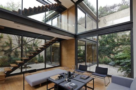 Gallery of House with Four Courtyards / Andrés Stebelski Arquitecto - 1