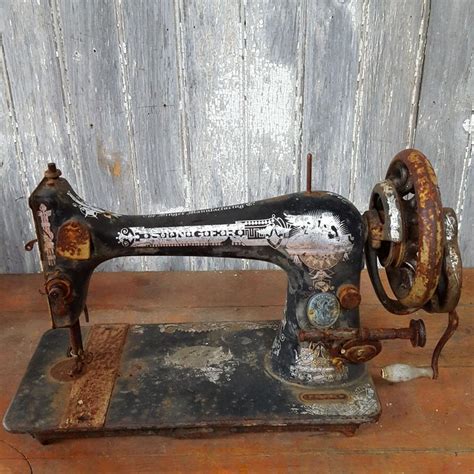Image result for Hand-Cranked Sewing Machine