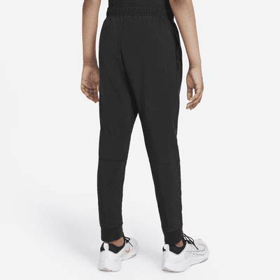 Nike Dri-FIT Older Kids' (Boys') Woven Training Trousers. Nike IN