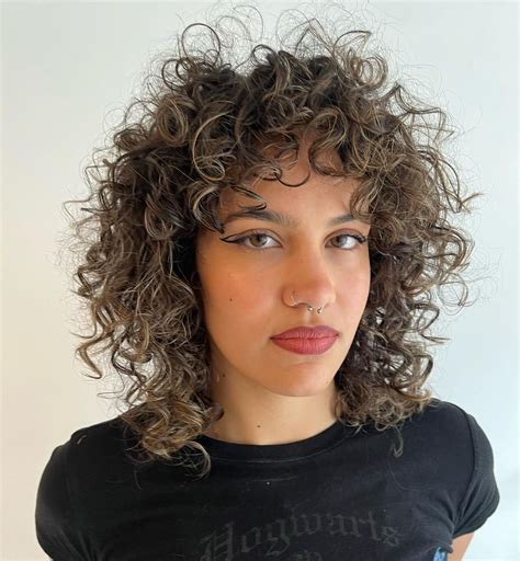30 Wolf Cut Curly Hair Ideas to Let Your Curls Stand Out - Hair Adviser