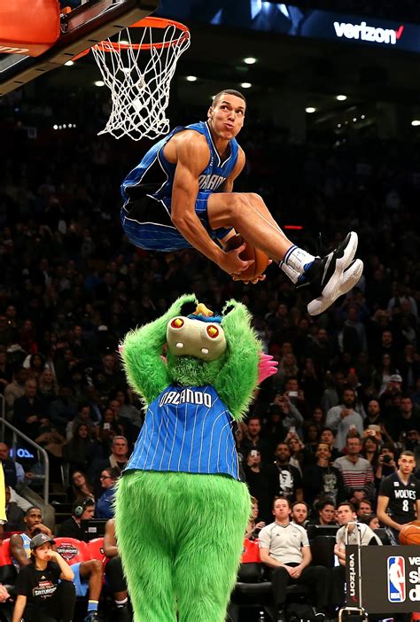 Watch: Aaron Gordon dunks over hoverboarding mascot | 9news.com