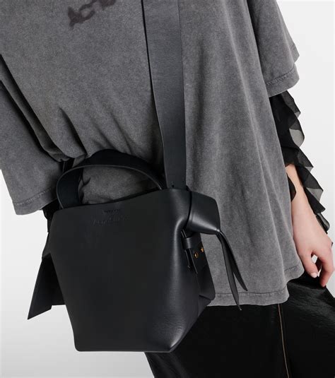 Musubi Mini leather shoulder bag in black - Acne Studios | Mytheresa