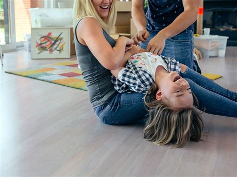 Mother Tickling Her Sons Feet On Stock Photo 26784859 | Shutterstock