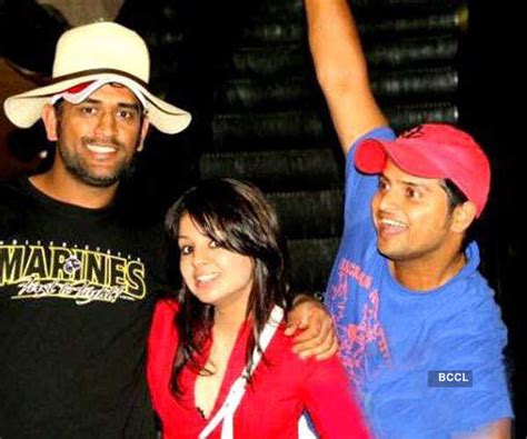 This excellent but rare pic shows Mahendra Singh Dhoni with wife Sakhi ...
