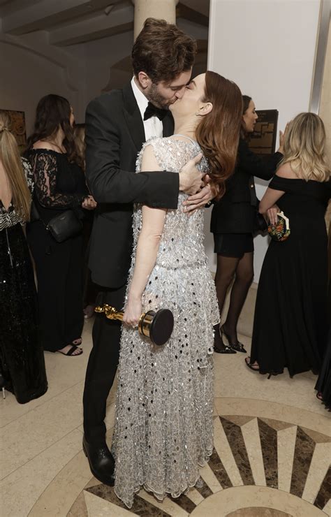 Emma Stone kisses husband Dave McCary at Oscars 2024 party