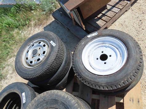 15 Trailer Tires - some with rims ; (6) 8" rims + (7) 12" rims + (2) 13 ...