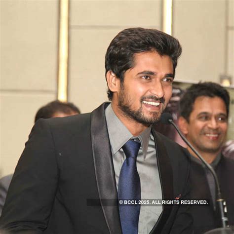 Aishwarya Arjun with father-cum-director Arjun Sarja during the launch ...