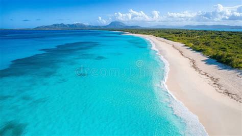 Aerial shots of the turquoise water, reef formations, beach and shipwreck at Henrietta Rocks.