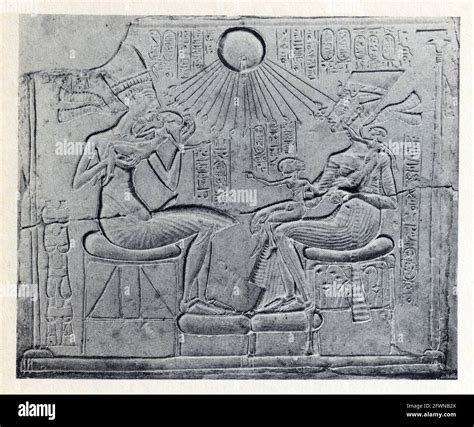 Relief of Akhenaten,Nefertiti and three of their daughters in a ...