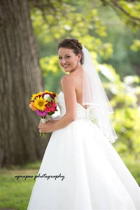 A beautiful lace wedding dress, which was backed with sea pearl ...