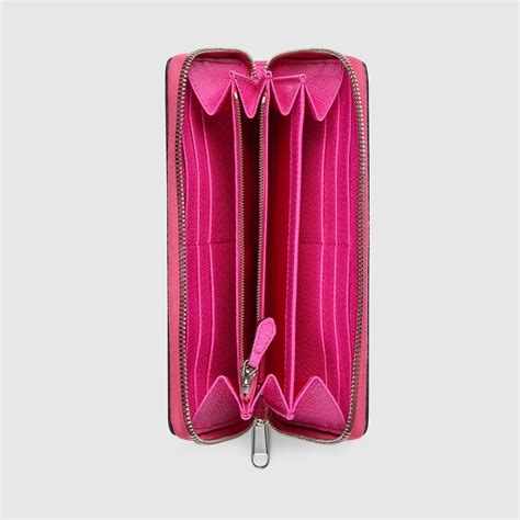 กระเป๋าสตางค์ GG Monogram zip around wallet with print inโมโนแกรม GG สี ...