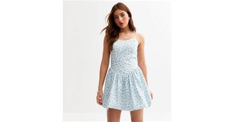 Girls White Floral Print Bubble Hem Poplin Mini Dress | New Look