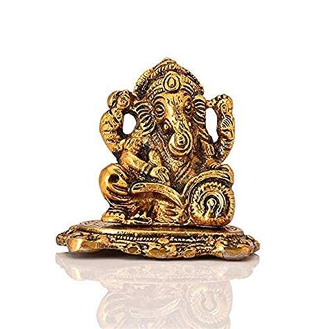 Buy White Metal Gold Color Ganesh Reding Book Online at Low Prices in ...